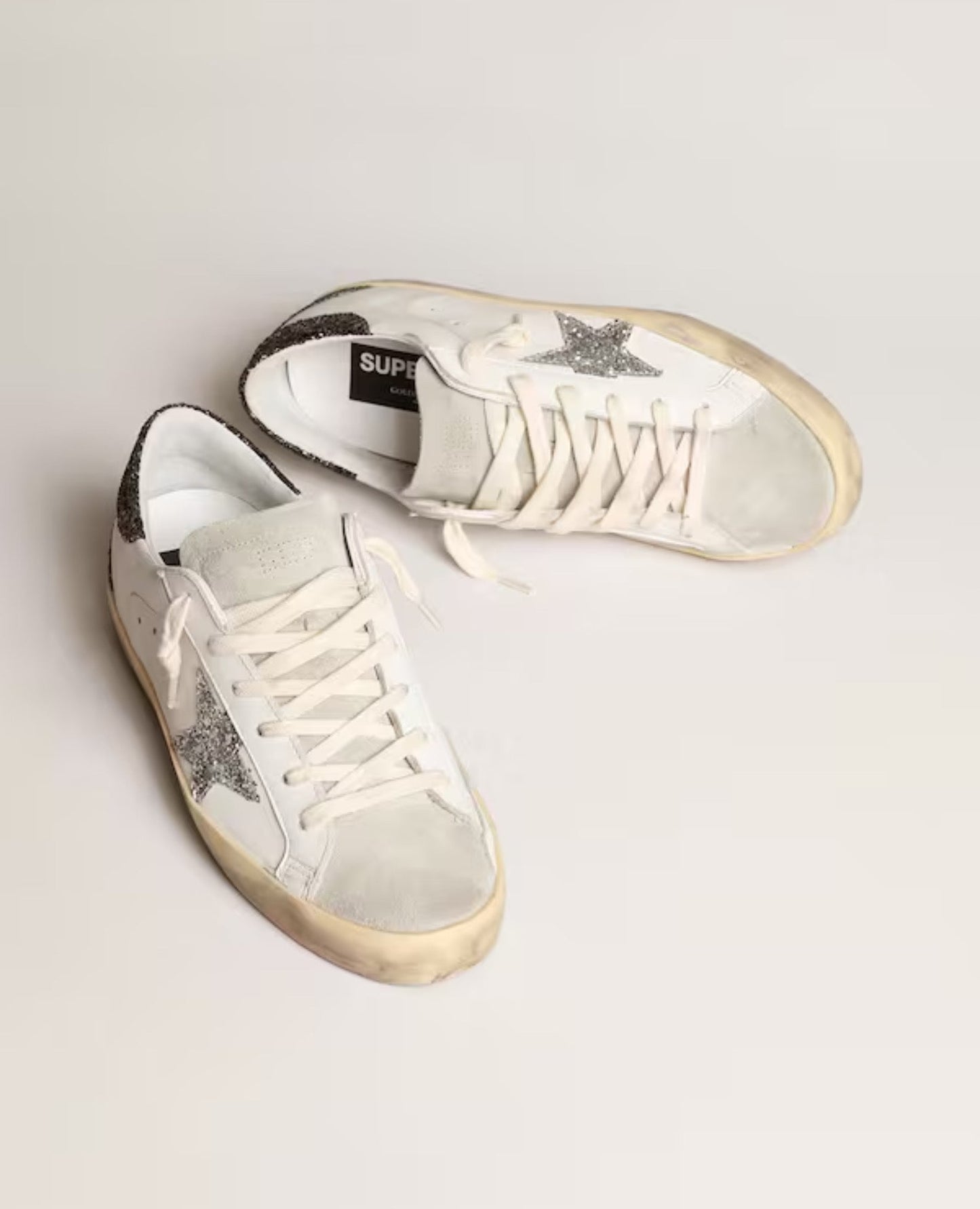 golden goose women's super-star with silver star and brown glitter heel tab_1