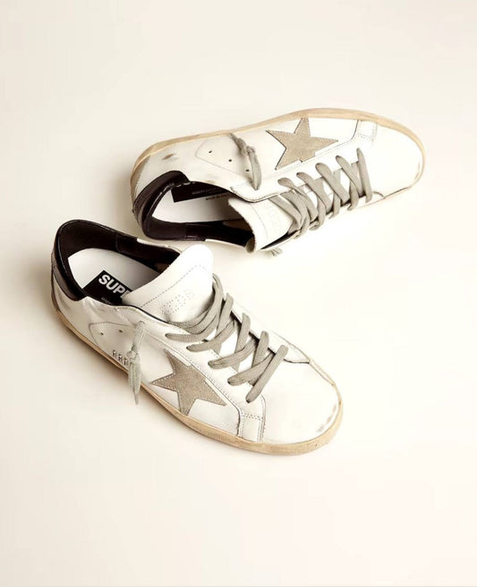 golden goose
super-star with black heel tab and metal stud lettering_1